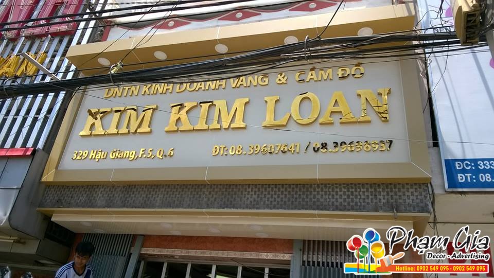 lam bien quang cao q6