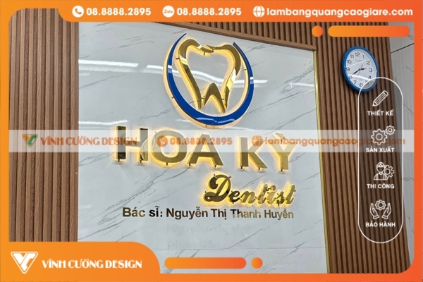 logo nha khoa chữ inox vàng gương nổi bật, sang trọng