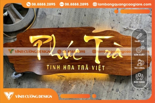 Thi công bảng hiệu gỗ có đèn led treo ngoài trời